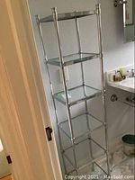 Full view of the six-tier etagere against wall