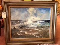 Full view of the framed acrylic painting showing the seascape with waves and sky.