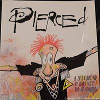 Cover of the book 'Pierced - A Zits Close-Up' featuring a cartoon character with red spiked hair and exaggerated facial features, by Jerry Scott and Jim Borgman.