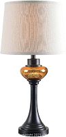 Full view of bronze table lamp with amber glass accent and beige fabric shade on top.