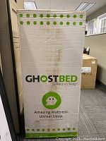 Boxed GhostBed mattress by Nature’s Sleep showing front packaging with logo and tagline