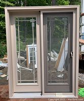 Exterior view showing sandalwood-finished main door with Low-E glass and matching screen door