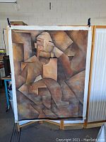 Full view of the large cubist abstract oil painting showing geometric human figure with earthy tones.