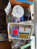 Top view showing Polaroid 669 film boxes, a white box labeled soft rubber, and a large container possibly the positive negative clearing tank