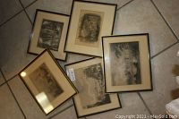 Six professionally framed original etchings approximately 10 x 8 inches each, laid out on floor showing varied architectural and landscape scenes with some light sunning visible on paper.