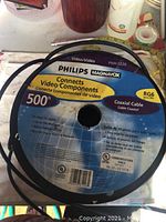 View of the cable label showing Philips Magnavox branding and specifications including 500 feet length and RG6 type coaxial cable.