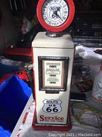 Front view showing clock top and gasoline display with Route 66 branding