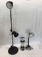 Overall view of the two lamps and the GE battery-powered lantern showing scale and design of each item.