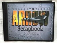 Front cover of 'The Arrow Scrapbook' featuring steel rivet design background and text with a model of Avro Arrow jet