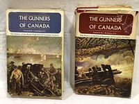 Two books with illustrated dust jackets, one blue and one maroon, titled The Gunners of Canada.
