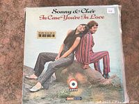 Front cover of Sonny & Cher LP 'In Case You're In Love' showing artist photo and ATCO label