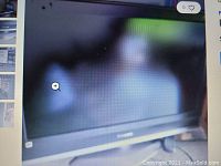 45 inch Panasonic TV showing front view of screen and base stand.