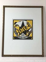 Framed lithograph artwork showing full front view with frame and mat visible.