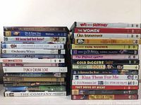Two stacked columns of 28 DVD cases with visible titles of various movies.