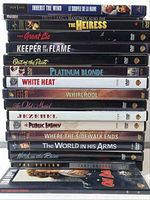 Stacked DVDs showing front spines with classic vintage film titles