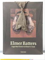 Front cover of the book with beige nylon stocking wrapped around and feet photo on cover