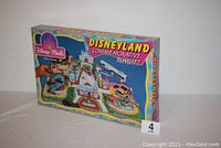 Box of the Disneyland Commemorative Playset by Sears, showing colorful graphics and branding.