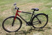 Full side view of Concord SC 700 hybrid bicycle showing frame, wheels, fenders and kickstand