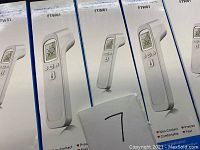 Set of 5 FTW01 forehead thermometers in original boxes showing product image and features.
