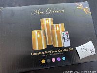 Box of Nice Dream Flameless Real Wax Candle Set with remote shown on front of box