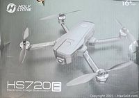 Front box showing Holy Stone HS720E drone image, 16+ recommended age, model name, and electronic image stabilization branding
