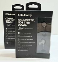 Two sealed boxes of Skullcandy Indy Xt true wireless earbuds shown from front with product features listed.