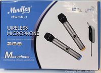 Front of box showing Moukey MwmU-3 wireless microphone set with two handheld microphones and one wireless receiver.