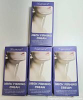 Four sealed purple boxes of Nuonove Neck Firming Cream 80g, showing front label with image and text.