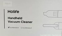 Photo of Holife handheld vacuum cleaner box label showing model HLHM555ASUS and illustration of vacuum cleaner parts.