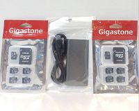 Two packs of Gigastone microSD cards each containing four 16GB cards and one microSD adapter, displayed with the 2TB gray external hard drive and USB cable in original packaging.