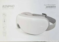 Box of Renpho RF-EM001 Eye Massager showing product name, model, and features such as air pressure, heat compression, music therapy, vibration massage suitable for eye fatigue relief.
