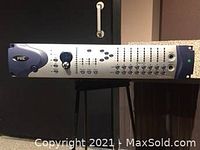 Front view showing gain knobs, LED meters, XLR inputs, headphone jack and rack ears