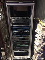Front view of 72" rack fully populated with equipment