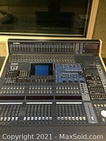 Front view of console showing full control surface and side panels