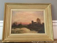 Framed oil painting showing the full artwork including gold-toned frame with visible wear on corners.