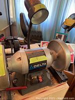 Overall setup showing grinder, cart and lamp