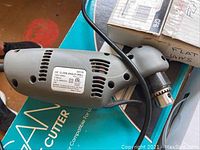 Grey corded 3/8" close angle drill with keyed chuck and vented housing