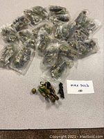 Lot of 21 bagged plastic men and one figure out of bag with accessories