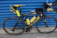 Full left-side view showing complete bike with accessories