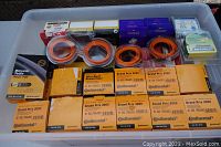 Top view of bin showing Continental boxes, rim tape, and various tube and tire boxes