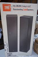 Front of cardboard box showing illustration of two JBL900 2-way 6-1/2" floorstanding speakers