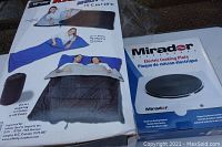 Box of multi-use sleeping bag showing model uses: as single bag, double bag, or fleece bag, with temperature ranges, in black and blue colors.