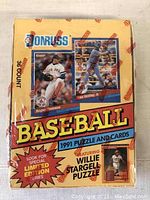 Front of the unopened box showing the title, player images, and Willie Stargell puzzle mention