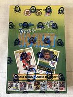 Front view of sealed 1992 Premier hockey cards box with O-Pee-Chee branding and images of hockey players.