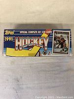 Front and side view of the shrink-wrapped 1991 Topps Hockey Card box showing branding and card count