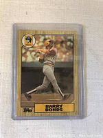 Front of Barry Bonds baseball card showing action shot and name.