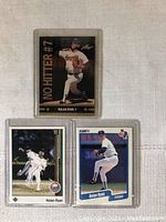 Three Nolan Ryan baseball cards front view showing different card designs