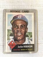 Front of the Jackie Robinson 1952 Topps rookie card with player's illustrated portrait and Brooklyn Dodgers label.