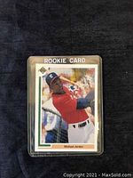 Front side of Michael Jordan Chicago White Sox rookie baseball card showing Jordan batting, labeled 'ROOKIE CARD'.