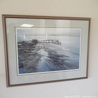 Full view of framed print depicting river and dock scene with muted blues and grays.